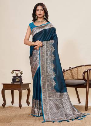 Garb This Party Wear Saree Paired With Blouse.This Saree And Blouse Are Satin Silk Fabric With Woven Jari Border Galla Designer. Buy This Pretty Saree Now.
