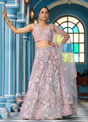 Attrective Looking This Party Wear Fine Color Fancy Heavy Designer Choli And Lahenga Fabriced On Net And Dupatta Net In Fabricated Beautified With Attrective Designer Sequance Embroidery Work. Buy Now.