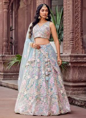 Attrective Looking This Party Wear Fine Color Fancy Heavy Designer Choli And Lahenga Fabriced On Net And Dupatta Net In Fabricated Beautified With Attrective Designer Sequance Embroidery Work. Buy Now.