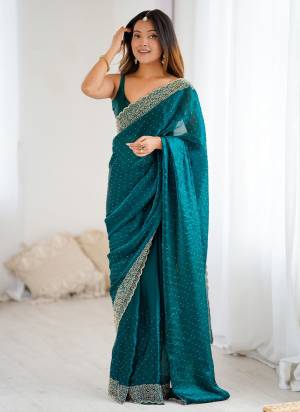 Looking These Party Wear Saree in Fine Colored.These Saree Are Fendy Satin And Blouse is Fendy Satin Fabricated.Its Beautified With Designer Zarkan Hand Work.
