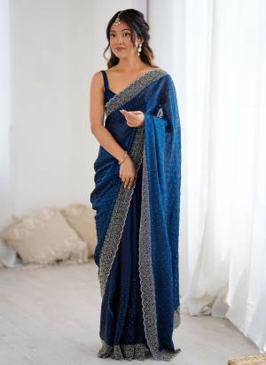Looking These Party Wear Saree in Fine Colored.These Saree Are Fendy Satin And Blouse is Fendy Satin Fabricated.Its Beautified With Designer Zarkan Hand Work.