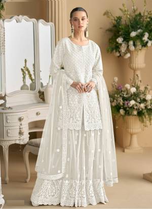 Attractive These Party Wear Free Size Stitched Plazzo Suit in Fine Colored Pair With Dupatta.These Top And Dupatta Are Net And Bottom Are Crepe Silk And Pair With Santoon Inner.Its Beautified With Heavy Designer Embroidery Work.