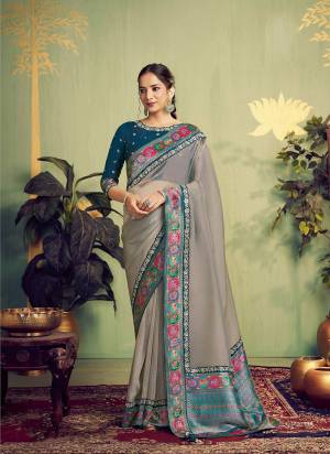 Look Attractive These Designer Party Wear Fancy Saree in Fine Colored.These Saree Are Woven Tissue Silk And Blouse Two Tone Silk is Fabricated.Its Beautified Fancy Designer Embroidery, Hand Work.