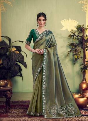 Look Attractive These Designer Party Wear Fancy Saree in Fine Colored.These Saree Are Glass Tissue And Blouse Malai Satin Silk is Fabricated.Its Beautified Fancy Designer Embroidery, Hand Work.