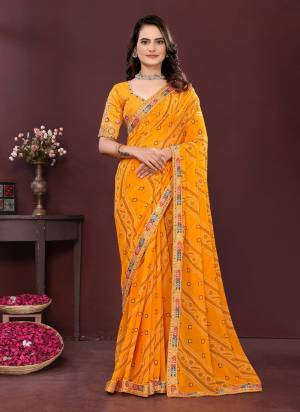 Garb These Party Wear Saree in Fine Colored.These Saree Are Georgette Are Georgette And Blouse is Art Silk Fabricated.Its Beautified With Designer Bandhani Printed With Embroidery Work Lace Border And Blouse.