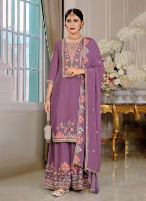 Garb These Designer Plazzo Suit in Fine Colored Pair With Bottom And Dupatta.These Top Are Chinon And Dupatta Are Fabricated On Chinon Pair With Chinon Bottom.Its Beautified With Crepe Inner.Its Beautified With Heavy Designer Embroidery Work.