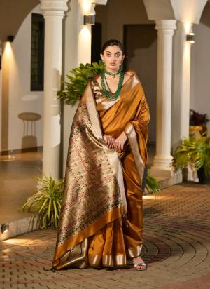 Attactive These Festive Party Wear Saree in Fine Colored.These Saree And Blouse is Fabricated On Khadi Raw Silk.Its Beautified With Woven Temple Border DesignerWith Madhubani Printed.