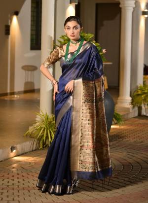 Attactive These Festive Party Wear Saree in Fine Colored.These Saree And Blouse is Fabricated On Khadi Raw Silk.Its Beautified With Woven Temple Border DesignerWith Madhubani Printed.