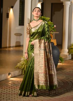 Attactive These Festive Party Wear Saree in Fine Colored.These Saree And Blouse is Fabricated On Khadi Raw Silk.Its Beautified With Woven Temple Border DesignerWith Madhubani Printed.