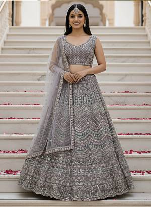 For A Fancy Designer Look,Grab These Lehenga Choli With Dupatta in Fine Colored.These Lehenga And Choli Are Net And Dupatta Are Fabricated On Soft Net Pair.Its Beautified With Heavy Designer Sequance,Dori Embroidery,Modif Crystal Pipe,Beads Hand Work. 