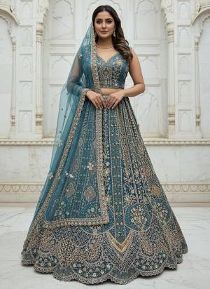For A Fancy Designer Look,Grab These Lehenga Choli With Dupatta in Fine Colored.These Lehenga And Choli Are Organza And Dupatta Are Fabricated On Organza Pair.Its Beautified With Heavy Designer Sequance,Jari,Dori,Multy Thread Embroidery,Diamond Work. 