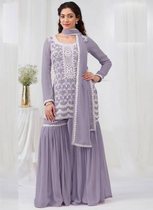 Garb These Designer Plazzo Suit in Fine Colored Pair With Bottom And Dupatta.These Top Are Georgette And Dupatta Are Fabricated On Georgette Pair With Georgette Bottom.Its Beautified With Santoon Inner.Its Beautified With Heavy Designer Embroidery Work.
