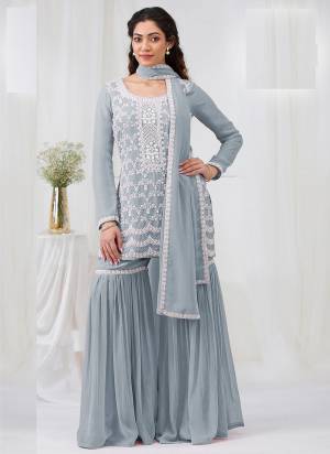Garb These Designer Plazzo Suit in Fine Colored Pair With Bottom And Dupatta.These Top Are Georgette And Dupatta Are Fabricated On Georgette Pair With Georgette Bottom.Its Beautified With Santoon Inner.Its Beautified With Heavy Designer Embroidery Work.
