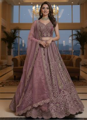 For A Fancy Designer Look,Grab These Lehenga Choli With Dupatta in Fine Colored.These Lehenga And Choli Are Net And Dupatta Are Fabricated On Soft Net Pair.Its Beautified With Heavy Designer Sequance, Jari,Dori,Multy Thread Embroidery,Zarcon Diamond Work. 