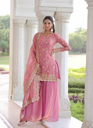 Attactive These Beautiful Looking Readymade Sharara Suit With Dupatta.These Top Bottom And Dupatta is Fabricated On Fendy Silk.Its Beautified With Designer Sequance Embroidery Work.