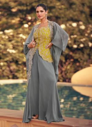 Looking These Party Wear Free Size Stitched Plazzo Suit With Shrug in Fine Colored Pair.These Top And Bottom Are Chinon And Pair With Chinon Shrug Fabric.Its Beautified With Heavy Designer Embroidery Work.