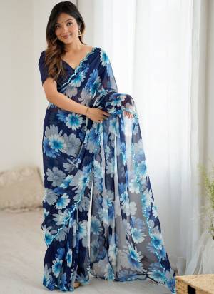 Garb These Party Wear Saree in Fine Colored.These Saree Are Georgette And Blouse is Georgette Fabricated.Its Beautified With Designer Printed With Mirror Cut Work Border.
