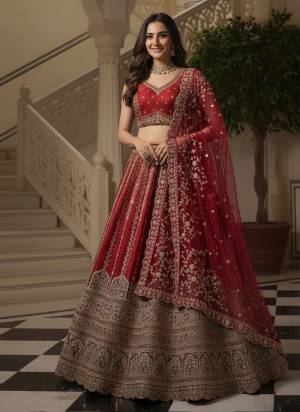 For A Fancy Designer Look,Grab These Lehenga Choli With Dupatta in Fine Colored.These Lehenga And Choli Are Gadhwal Silk And Dupatta Are Fabricated On Soft Net Pair.Its Beautified With Heavy Fancy Lace, Sequance,Chapat Jari,Thread Embroidery Work. 