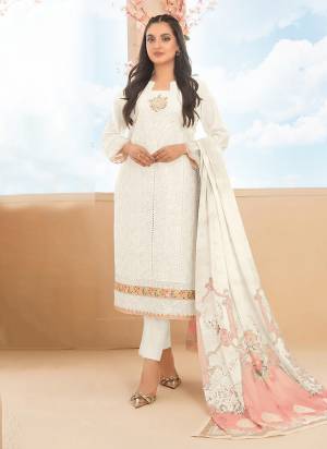 Garb These Designer Salwar Suit in Fine Colored Pair With Bottom And Dupatta.These Top Are Cotton And Dupatta Are Fabricated On Chanderi Pair With Cotton Bottom.Its Beautified With Santoon Inner.Its Beautified With Heavy Designer Embroidery Work.