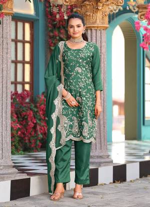 Attrective Looking These Party Wear Suit in Fine Colored Pair With Bottom And Dupatta.These Top Are Silk And Dupatta Are Fabricated On Silk Pair With Santoon Bottom.Its Beautified With Designer Heavy Embroidery Work.