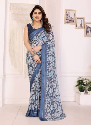 Attrective These Party Wear Saree in Fine Colored.These Saree Are Moss Satin Patta And Blouse is Moss Satin Patta Fabricated.Its Beautified With Designer Flower Printed.