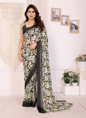 Attrective These Party Wear Saree in Fine Colored.These Saree Are Moss Satin Patta And Blouse is Moss Satin Patta Fabricated.Its Beautified With Designer Flower Printed.