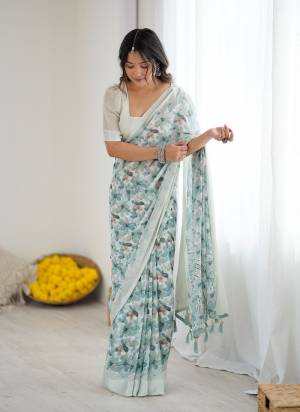 Garb These Party Wear Saree in Fine Colored.These Saree Are Moss Satin Patta And Blouse is Moss Satin Patta Fabricated.Its Beautified With Designer Printed.