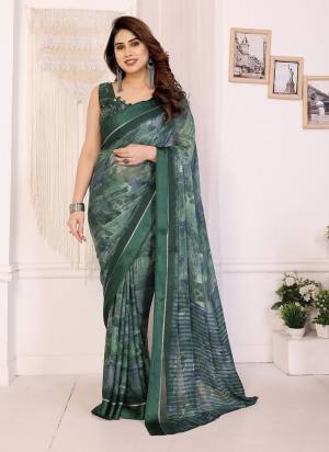 Garb These Party Wear Saree in Fine Colored.These Saree Are Moss Satin Patta And Blouse is Moss Satin Patta Fabricated.Its Beautified With Designer Printed.