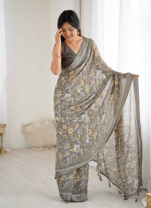 Garb These Party Wear Saree in Fine Colored.These Saree Are Moss Satin Patta And Blouse is Moss Satin Patta Fabricated.Its Beautified With Woven Patta Border Designer Printed.