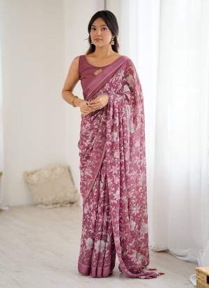 Garb These Party Wear Saree in Fine Colored.These Saree Are Moss Satin Patta And Blouse is Moss Satin Patta Fabricated.Its Beautified With Woven Patta Border Designer Printed.