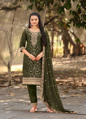 Attrective Looking These Party Wear Suit in Fine Colored Pair With Bottom And Dupatta.These Top Are Viscose Jacquard And Dupatta Are Fabricated On Chinon Pair With Santoon Bottom.Its Beautified With Woven Designer With Embroidery Work.