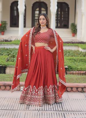 Looking These Party Wear Lehenga Choli in Fine Colored. These Lehenga And Blouse Are Vichitra Silk And Dupatta Are Fabricated On Vichitra Silk Fabriced. It is Beautified With Designer Sequance,Multy Thread Embroidery Work.