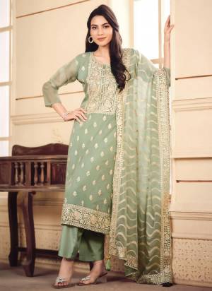 Attractive These Party Wear Salwar Suit in Fine Colored Pair With Bottom And Dupatta.These Top Are Organza And Dupatta Are Fabricated On Organza Pair With Dull Santoon Bottom.Its Beautified With Designer Embroidery Work.