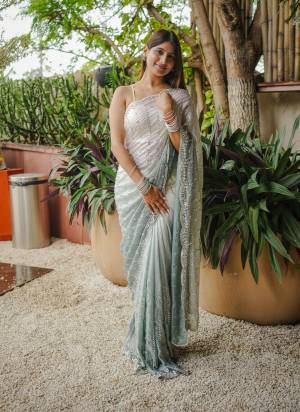 Looking These Fancy Party Wear Saree in Fine Pedding Colored.These Saree Are Fendy Satin And Blouse is Fendy Satin Fabricated.Its Beautified With Pedding Doul Color,Designer Beads Hand Work.