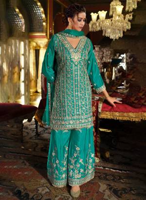 Garb These Party Wear Free Size Stitched Plazzo Suit With Dupatta in Fine Colored Pair.These Top And Bottom Are Chinon And Pair With Chinon Dupatta Fabric.Its Beautified With Heavy Designer Embroidery Work.