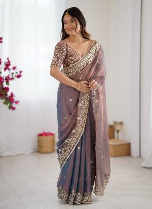 Looking These Party Wear Saree in Fine Two Tone Colored.These Saree Are Fendy Chiffon And Blouse is Fendy Chiffon Fabricated.Its Beautified With Two Tone Color With Designer Sequance Embroidery Work.