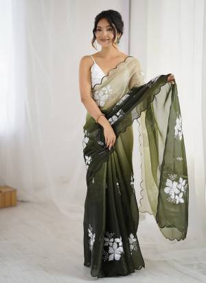 Garb These Party Wear Saree in Fine Dual Shaded Colored.These Saree Are Jimmy Choo And Blouse is Satin Silk Fabricated.Its Beautified With Pedding Color Printed With Designer Sequance Embroidery Work.