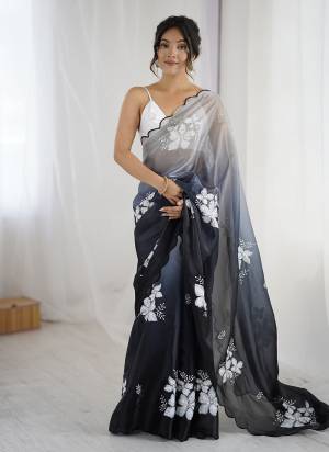 Garb These Party Wear Saree in Fine Dual Shaded Colored.These Saree Are Jimmy Choo And Blouse is Satin Silk Fabricated.Its Beautified With Pedding Color Printed With Designer Sequance Embroidery Work.