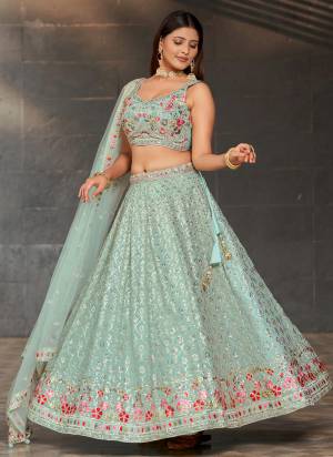 For A Designer Look,Grab These Party Wear Lehenga Choli in Fine Colored.These Lehenga Are Geoegette And Blouse Are Fabricated On Georgette Pair With Dupatta Are Soft Net.Its Beautified With Designer Thread,Sequance Embroidery Work.