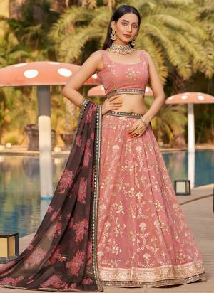 For A Designer Look,Grab These Party Wear Lehenga Choli in Fine Colored.These Lehenga Are Geoegette And Blouse Are Fabricated On Georgette Pair With Dupatta Are Organza.Its Beautified With Designer Thread,Sequance Embroidery Work.