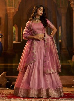 For A Designer Look,Grab These Lehenga Choli in Fine Colored.These Lehenga And Dupatta Are Fabricated On Organza Pair With Art Silk Blouse.Its Beautified With Designer Dori,Sequance,Jari Embroidery Work.