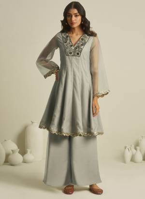 Attrective These Beautiful Party Wear Looking Readymade Top With Bottom.These Top And Bottom Are Tissue Fabricated.Its Beautified With Disigner Hand Work.