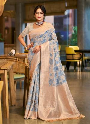 Garb These Fastive And Party Wear Saree in Fine Colored.These Saree And Blouse is Fabricated On Cotton Silk.Its Beautified With Woven Flower Designer.