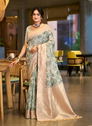 Garb These Fastive And Party Wear Saree in Fine Colored.These Saree And Blouse is Fabricated On Cotton Silk.Its Beautified With Woven Flower Designer.