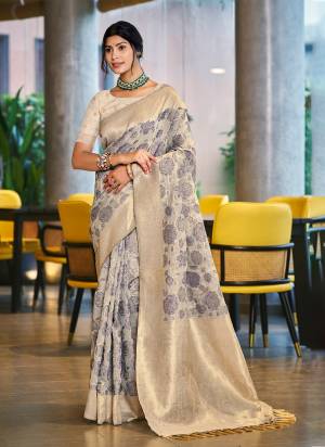 Garb These Fastive And Party Wear Saree in Fine Colored.These Saree And Blouse is Fabricated On Cotton Silk.Its Beautified With Woven Flower Designer.