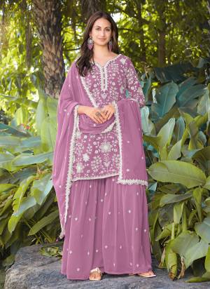 Attrective Looking These Party Wear Suit in Fine Colored Pair With Bottom And Dupatta.These Top Are Georgette And Dupatta Are Fabricated On Georgette Pair With Georgette Bottom.Its Beautified With Designer Embroidery,Beads Work.