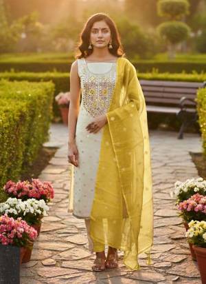 Looking These Disigner Suit in Fine Colored Pair With Bottom And Dupatta.These Top Are Simmer Jacquard And Dupatta Are Fabricated On Simmer Jacquard Pair With Santoon Bottom.Its Beautified With Woven Designer With Embroidery Work.