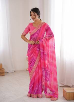 Attractive These Party Wear Saree in Fine Colored.These Saree Are Georgette Chiffon And Blouse is Banglori Fabricated.Its Beautified With Designer Pedding Laheriya Gold Foil Printed With Embroidery Work Lace Border.