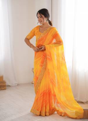 Attractive These Party Wear Saree in Fine Colored.These Saree Are Georgette Chiffon And Blouse is Banglori Fabricated.Its Beautified With Designer Pedding Laheriya Gold Foil Printed With Embroidery Work Lace Border.