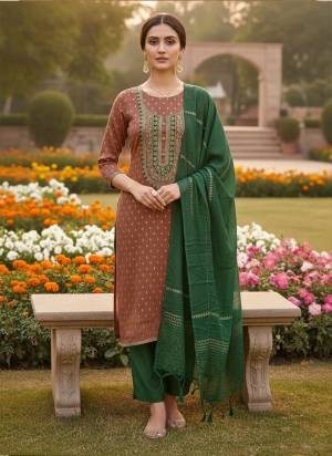 Looking These Disigner Suit in Fine Colored Pair With Bottom And Dupatta.These Top Are Simmer Jacquard And Dupatta Are Fabricated On Simmer Jacquard Pair With Santoon Bottom.Its Beautified With Woven Designer With Embroidery Work.